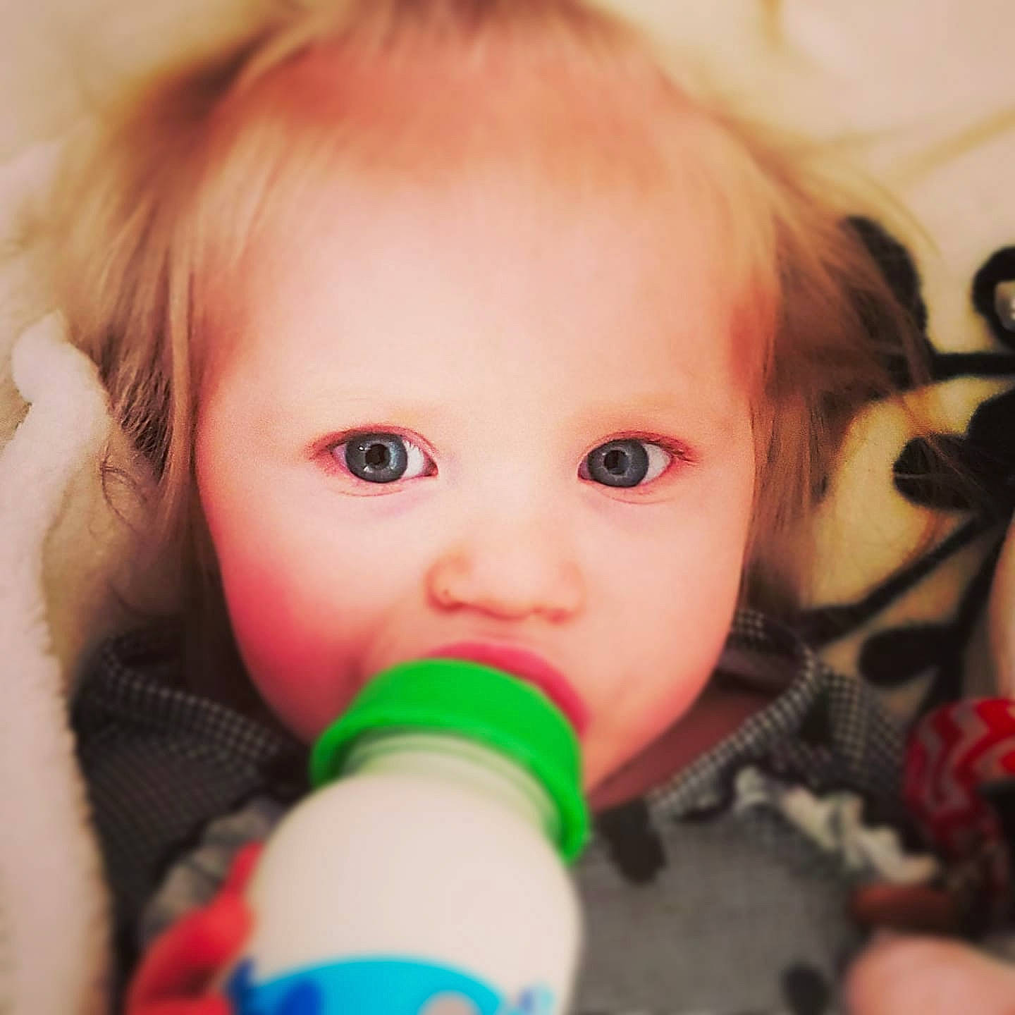 Oasis is registered to the contest to win money with this photo: baby, beauty, cheek, child, ear, eye, eyebrow, face, forehead, hair, head, iris, lip, mouth, nose, organ, person, play, product, skin