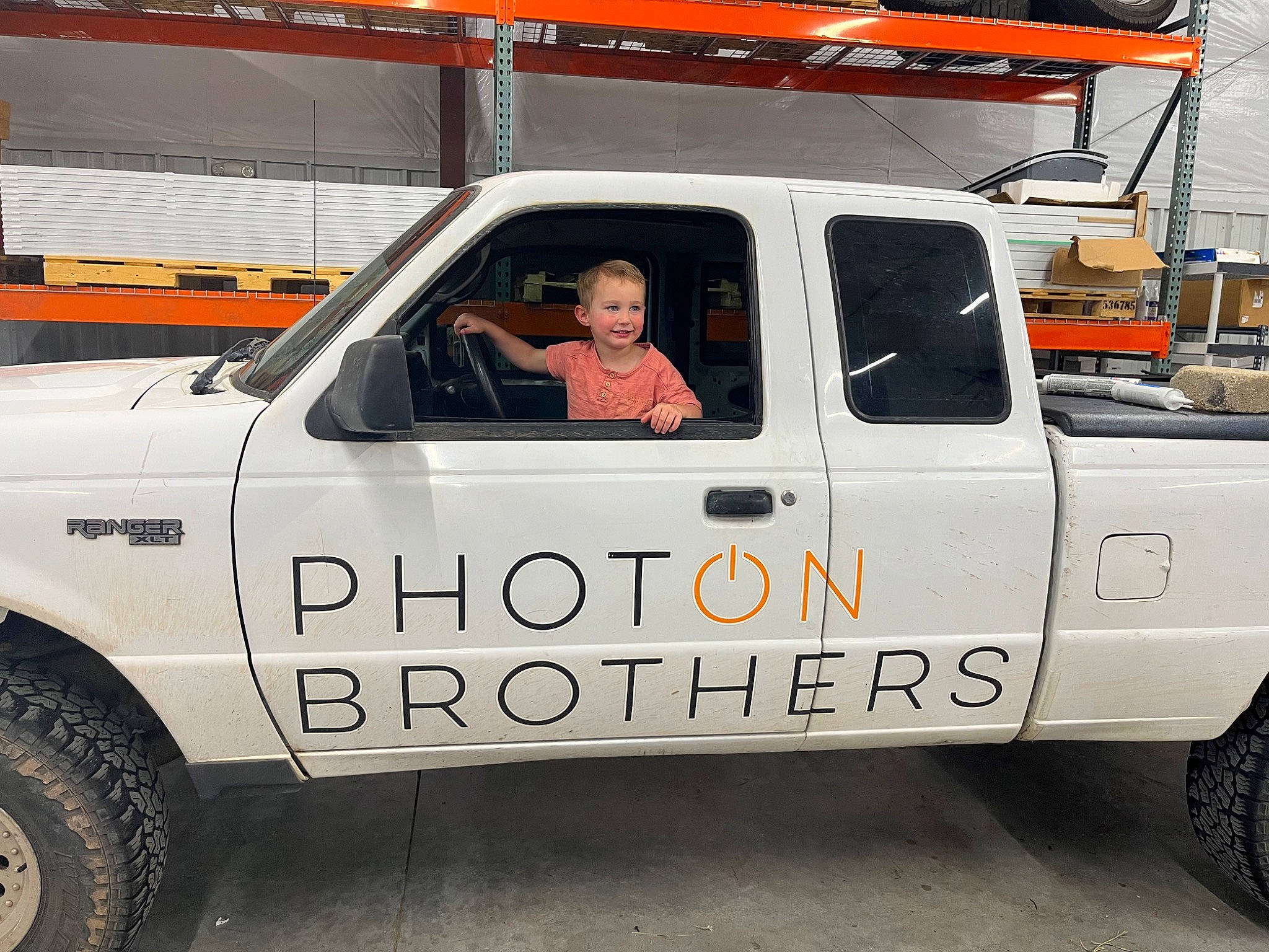 Wesley is registered to the contest to win money with this photo: alloy_wheel, automotive_design, automotive_exterior, automotive_tire, automotive_wheel_system, bumper, car, commercial_vehicle, fender, gas, hardtop, hood, joy, landscape, motor_vehicle, person, rim, tire, truck, vehicle