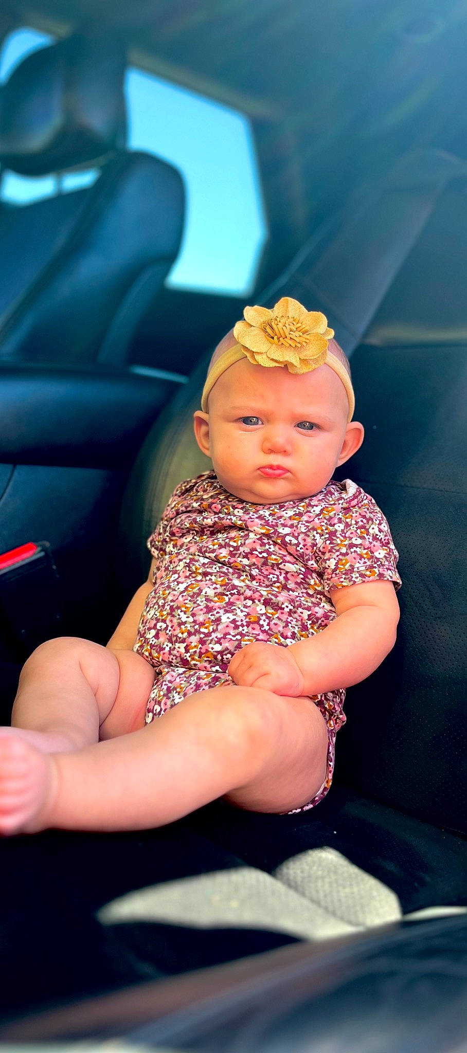 Ember is registered to the contest to win money with this photo: baby, baby_toddler_clothing, blond, child, comfort, event, finger, flash_photography, hand, happy, headpiece, human_leg, jewellery, leisure, nail, necklace, person, skin, thigh, thumb