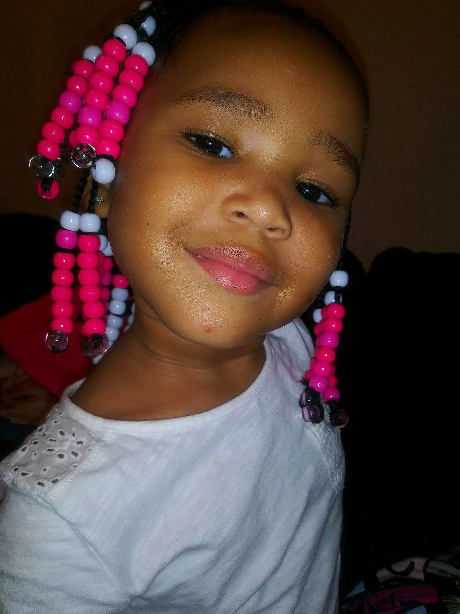 Ariona is registered to the contest to win money with this photo: cheek, child, chin, ear, eye, eyebrow, eyelash, face, forehead, fun, girl, hair_coloring, hairstyle, joy, lip, nose, person, pink, skin, smile