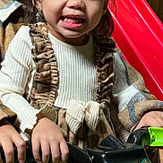 Liana is registered to the contest to win money with this photo: boy, child, children, clothing, cute, face, fun, girl, hands, happy, indoor, play, portrait, red_slide, ride_on_toy, sibling, smiling, together, toy_vehicle, wooden_wall