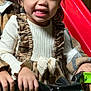 boy, child, children, clothing, cute, face, fun, girl, hands, happy, indoor, play, portrait, red_slide, ride_on_toy, sibling, smiling, together, toy_vehicle, wooden_wall