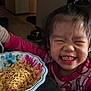 Liana joined the competition — help win amazing prizes! bowl, child, clothing, colorful, cute, dining, expression, face, food, fork, girl, hair, happy, indoor, meal, noodles, person, plate, smiling, table