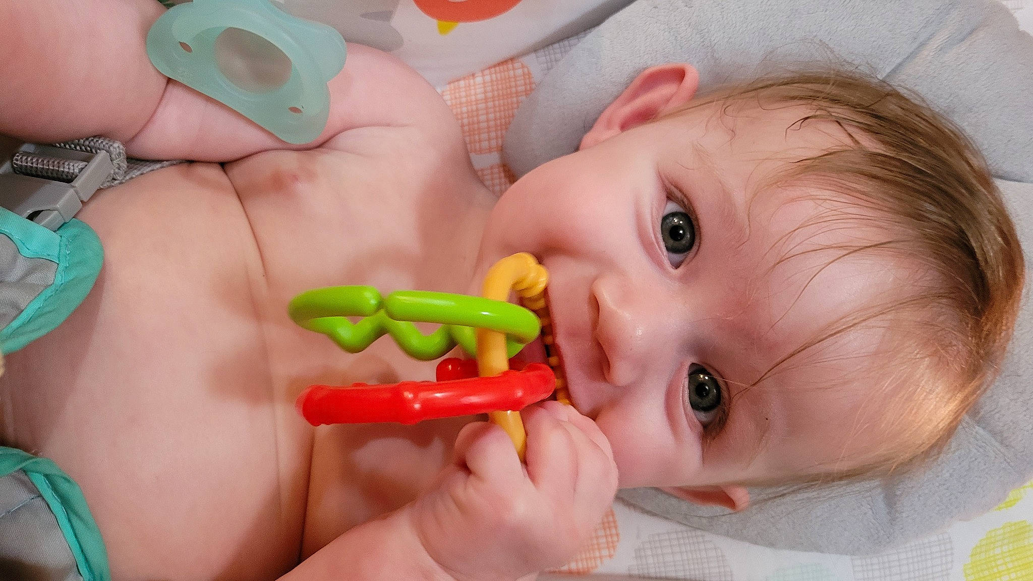 Huntley joined the competition — help win amazing prizes! baby_playing_with_toys, cheek, chin, ear, eye, eyebrow, eyelash, face, facial_expression, finger, gesture, hand, happy, iris, lip, mouth, nose, organ, person, pink