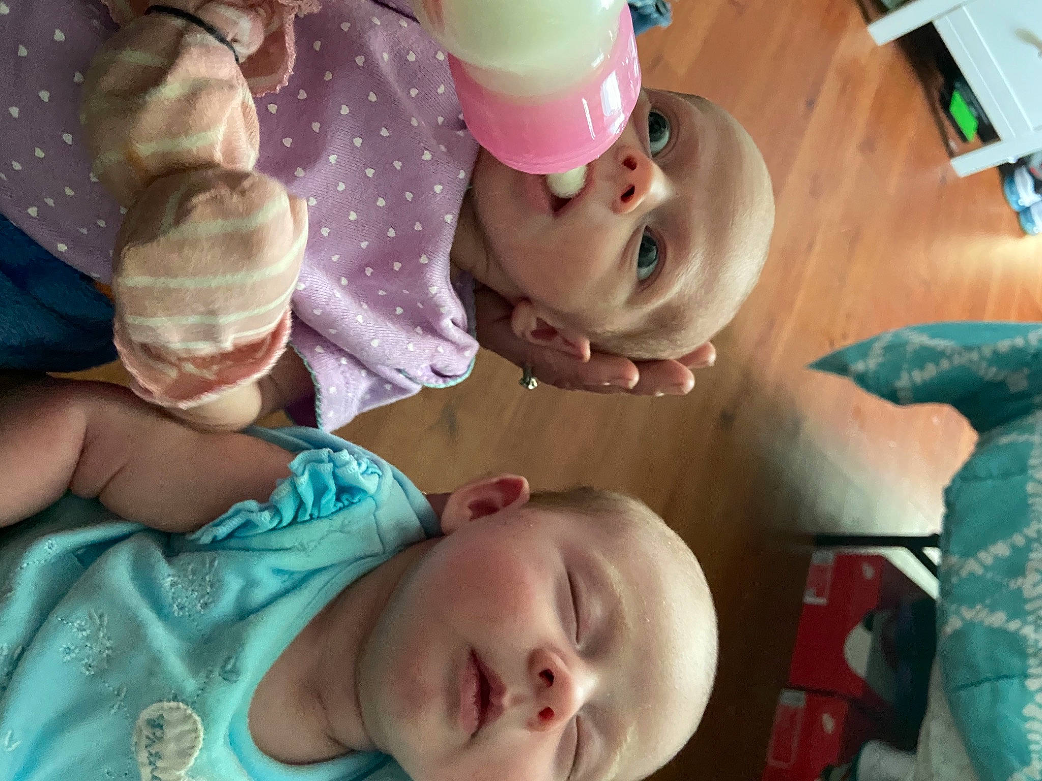 Emma is registered to the contest to win money with this photo: baby, baby_toddler_clothing, bathing, cap, cheek, child, event, eyelash, food, fun, happy, mouth, nose, pattern, person, pink, room, skin, smile, snapshot