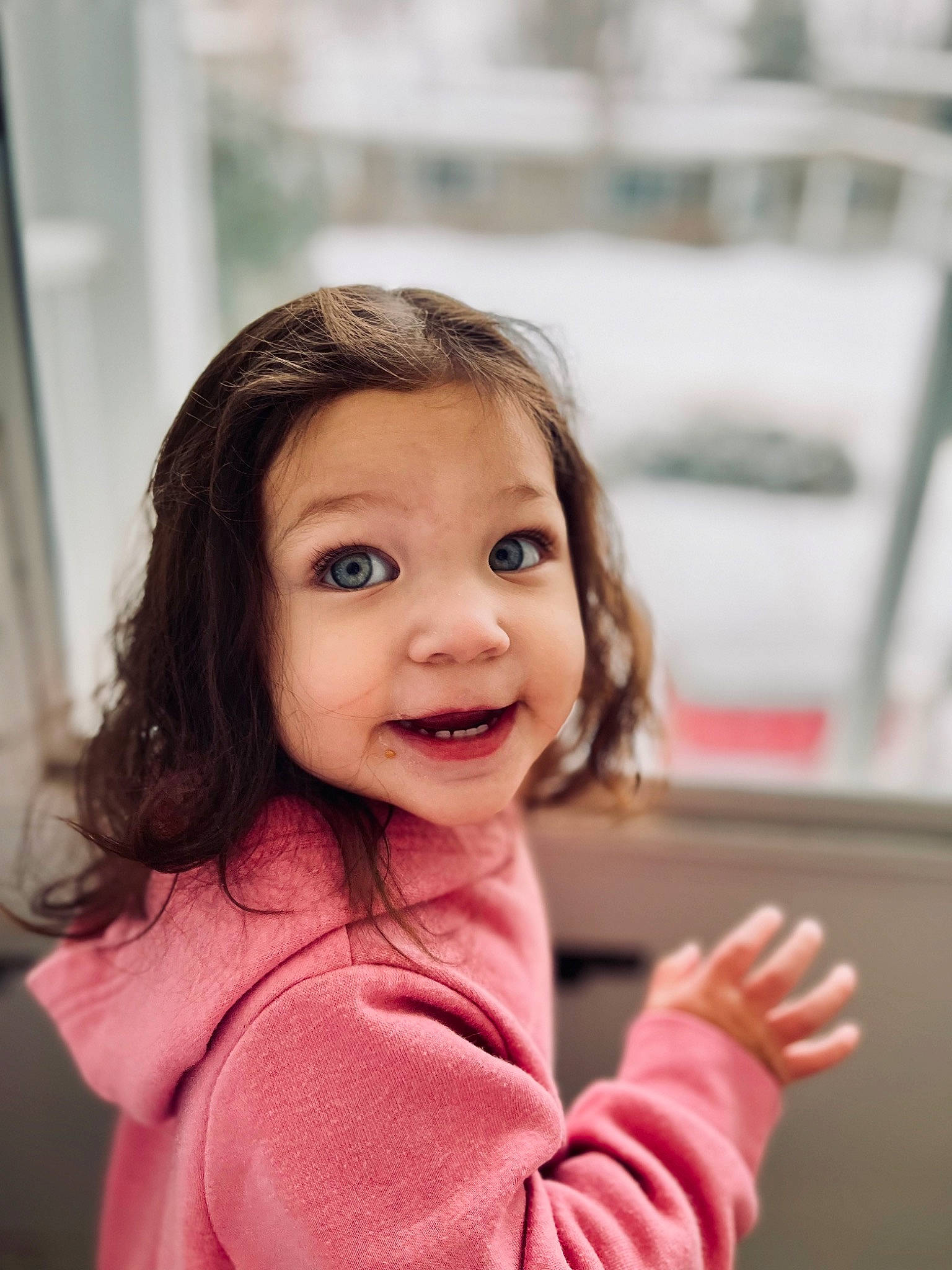 Kiana is registered to the contest to win money with this photo: baby_toddler_clothing, cheek, child, chin, eyelash, face, fun, gesture, happy, laugh, lip, magenta, nose, person, portrait_photography, sitting, skin, sleeve, smile, thumb