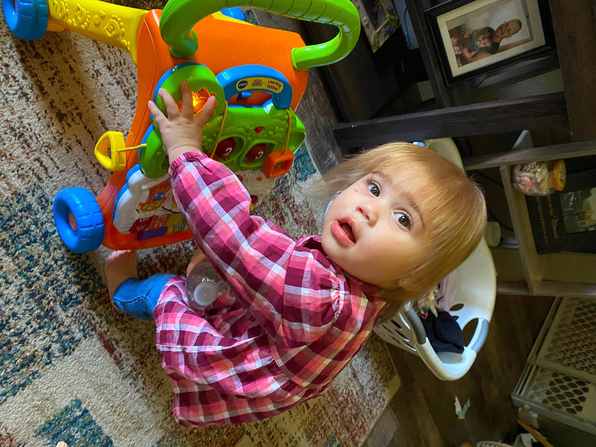 Harmoni is registered to the contest to win money with this photo: art, baby, baby_products, baby_toddler_clothing, baby_toys, child, doll, flooring, fun, leisure, pattern, person, picture_frame, plaid, plastic, play, room, stuffed_toy, tartan, toddler
