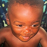 Kay'Dyn joined the competition — help win amazing prizes! baby, background, cheerful, child, closeup, cute, dark_skin, dinosaur_pattern, expression, eyes, face, hair, happy, indoors, person, portrait, shirtless, skin, smiling, young