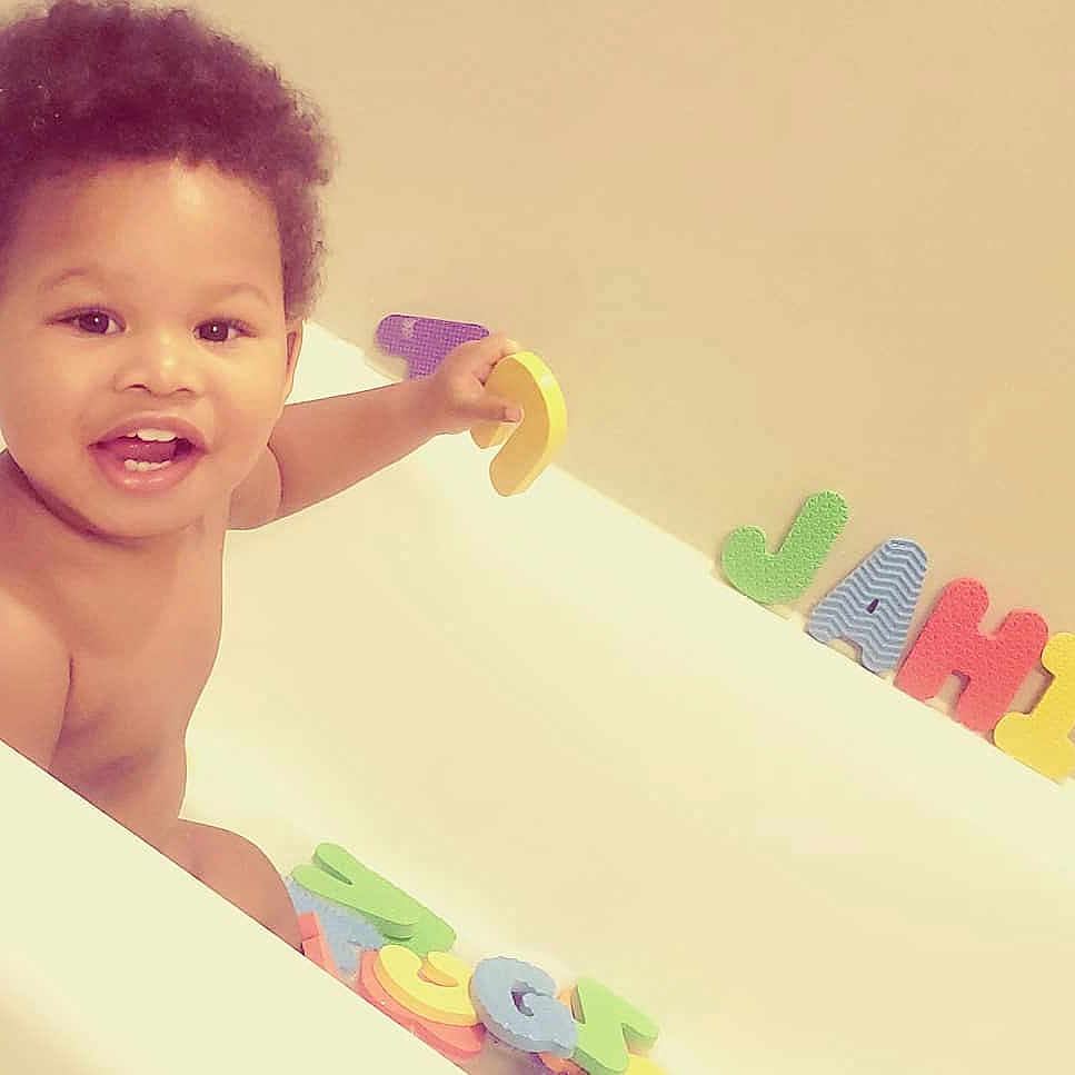 Jahi joined the competition — help win amazing prizes! baby, baby_bathing, baby_playing_with_toys, baby_products, baby_toys, bathing, bathtub, child, happy, person, play, product, skin, smile, toddler, toy