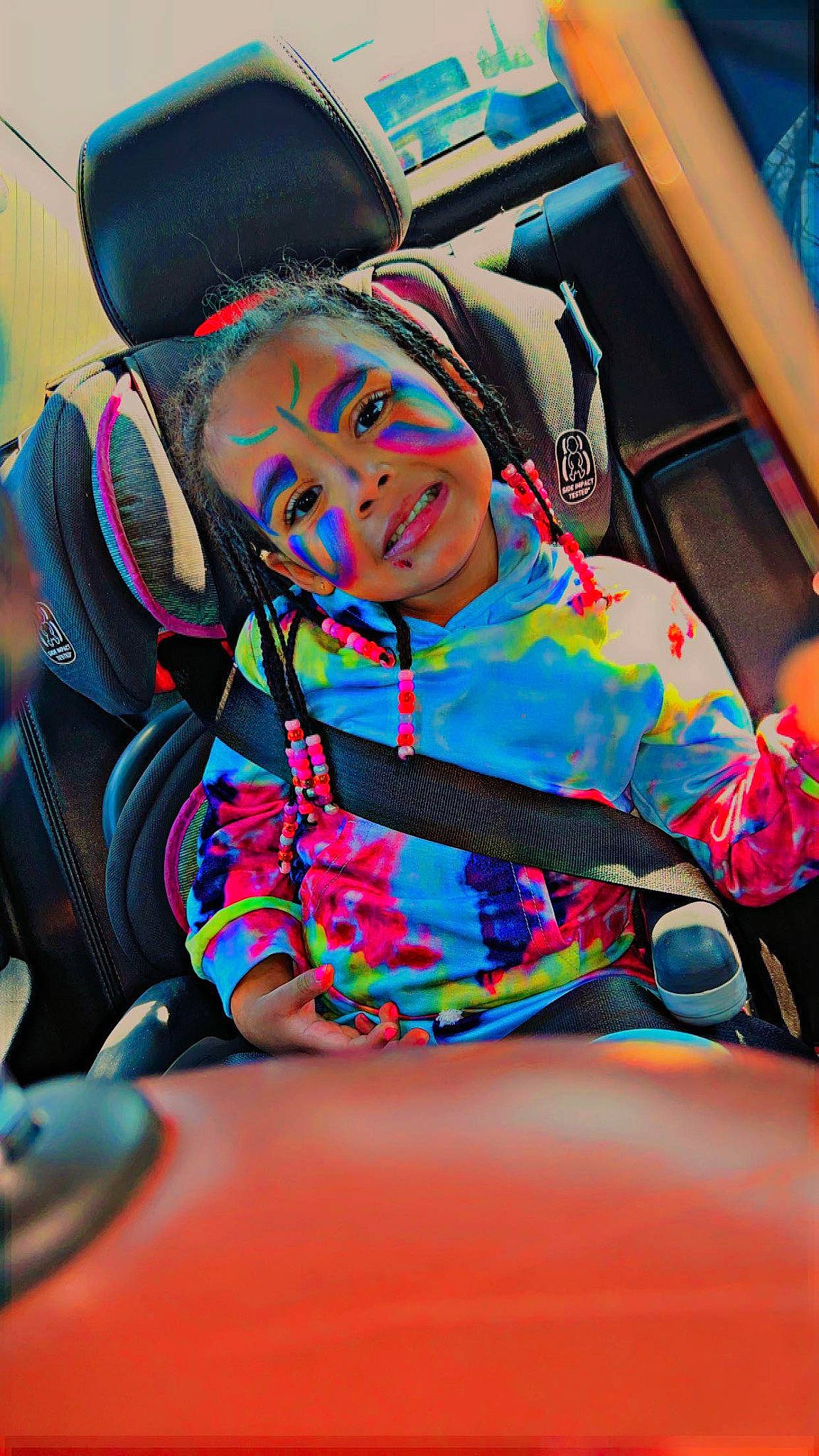 Kataleya is registered to the contest to win money with this photo: auto_part, automotive_design, car, car_seat, car_seat_cover, comfort, electric_blue, event, eyewear, family_car, fun, head_restraint, leisure, magenta, motor_vehicle, person, sitting, smile, steering_wheel, vehicle