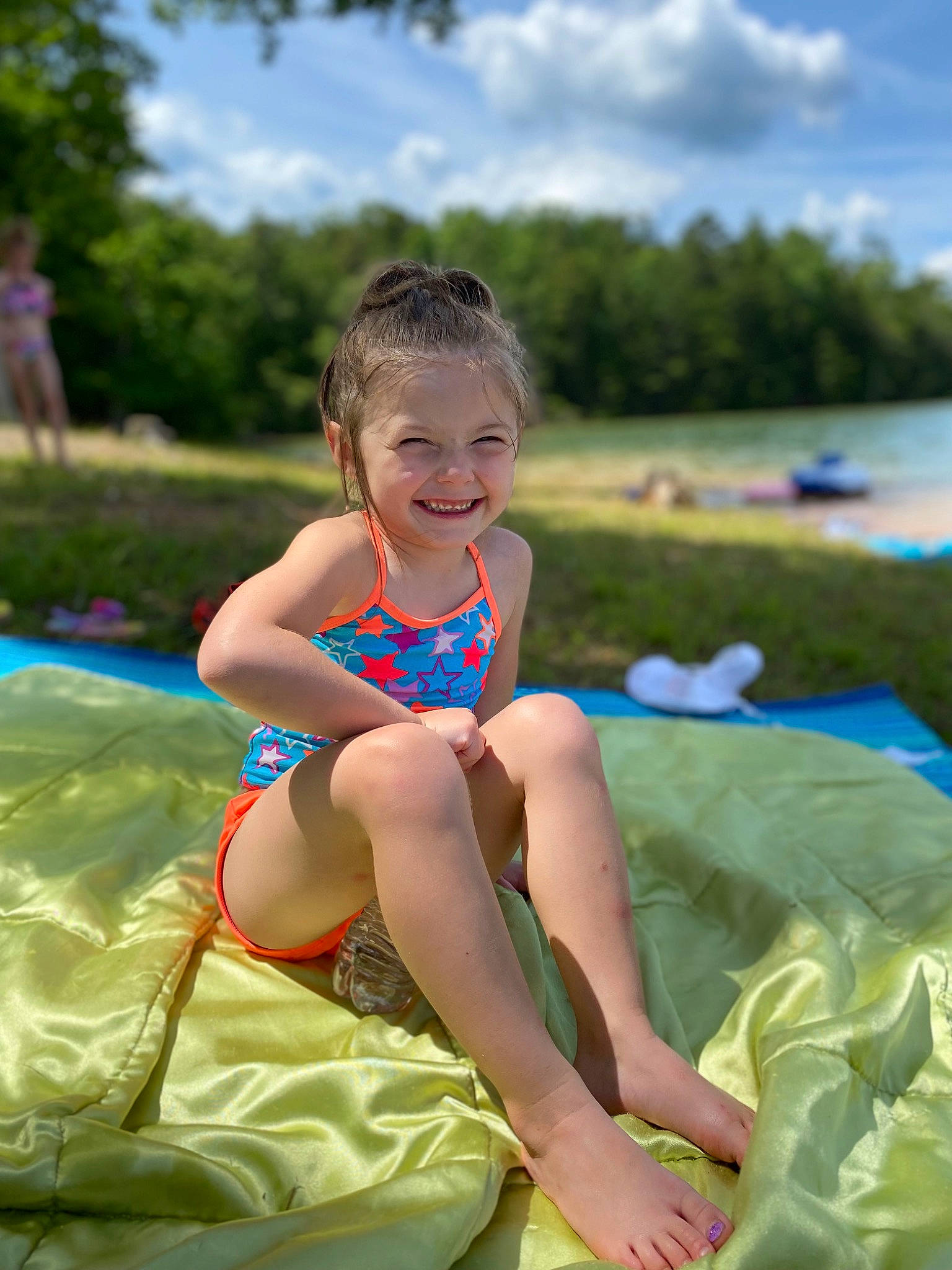 Aubrey joined the competition — help win amazing prizes! child, cloud, electric_blue, event, face, fun, grass, happy, inflatable, joy, leisure, people_in_nature, person, recreation, sitting, sky, smile, summer, swimwear, thigh