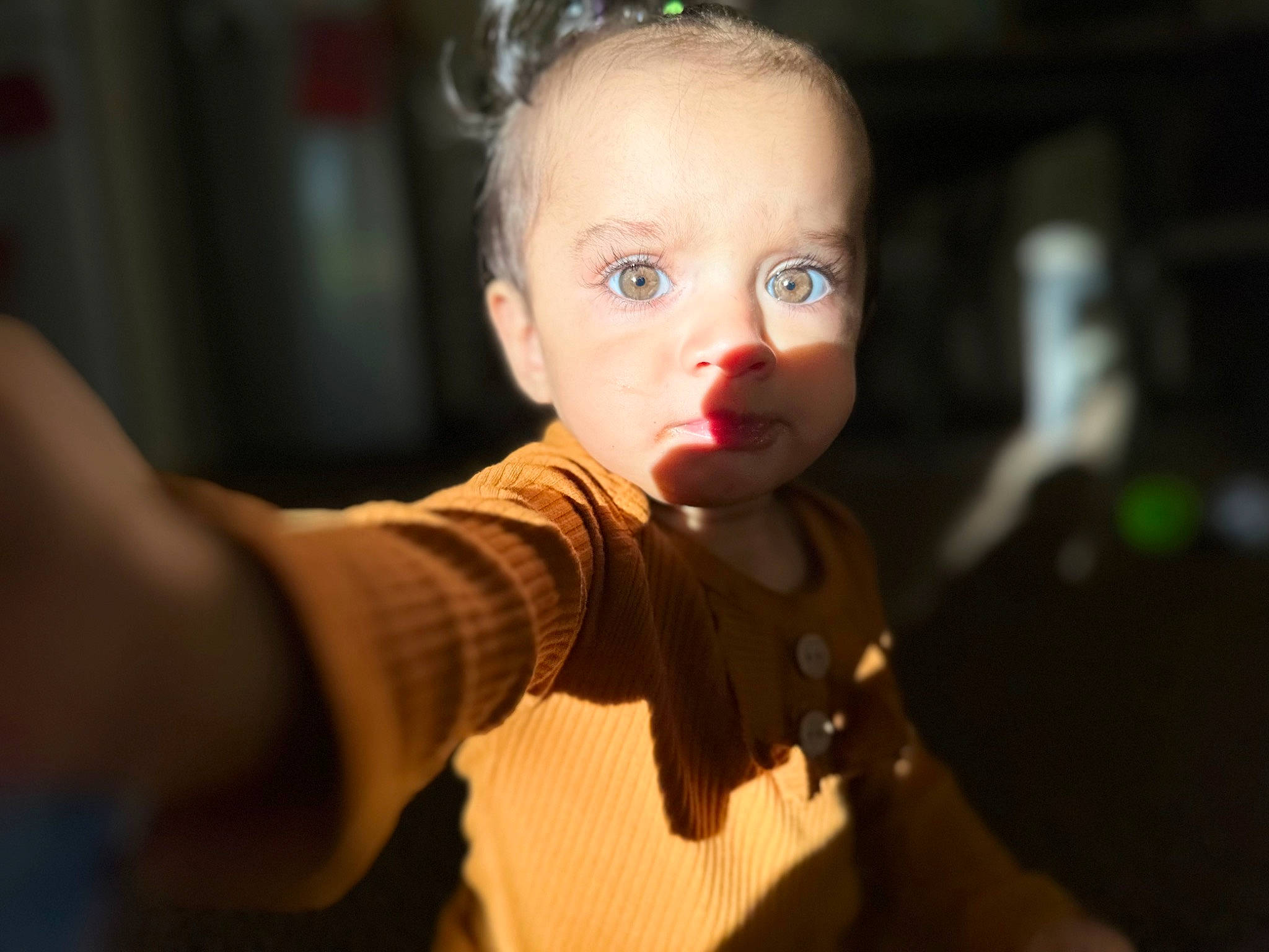 Estella joined the competition — help win amazing prizes! audio_equipment, baby, cheek, chest, child, darkness, ear, event, eyelash, flash_photography, fun, gesture, happy, human_body, jewellery, nail, nose, person, thumb, toddler