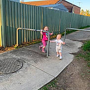 Syrus Billy-James is registered to the contest to win money with this photo: baby, backyard, child, city, clothing, female, footwear, girl, nature, outdoorplayarea, outdoors, path, person, playarea, road, shoe, shorts, street, urban, yard
