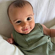 Wyatt joined the competition — help win amazing prizes! baby, child, closeup, cute, drool, eyes, face, green_clothing, happy, head, indoors, infant, lying_down, person, portrait, skin, sleeveless, smile, texture, white_background