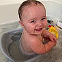 baby, bath, bathseat, bathtub, bubble, child, cute, face, foam, happy, indoors, infant, person, play, sitting, skin, smile, toy, water, wet