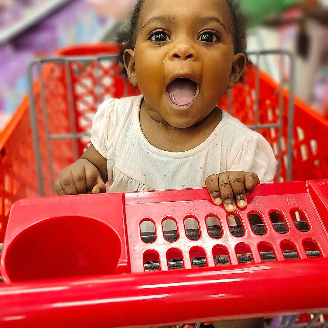 Braighlee joined the competition — help win amazing prizes! aisle, baby, child, clothing, cute, expression, face, foot, grocery, happy, holding, infant, person, retail, shopping, shopping_cart, store, supermarket, surprised, toddler