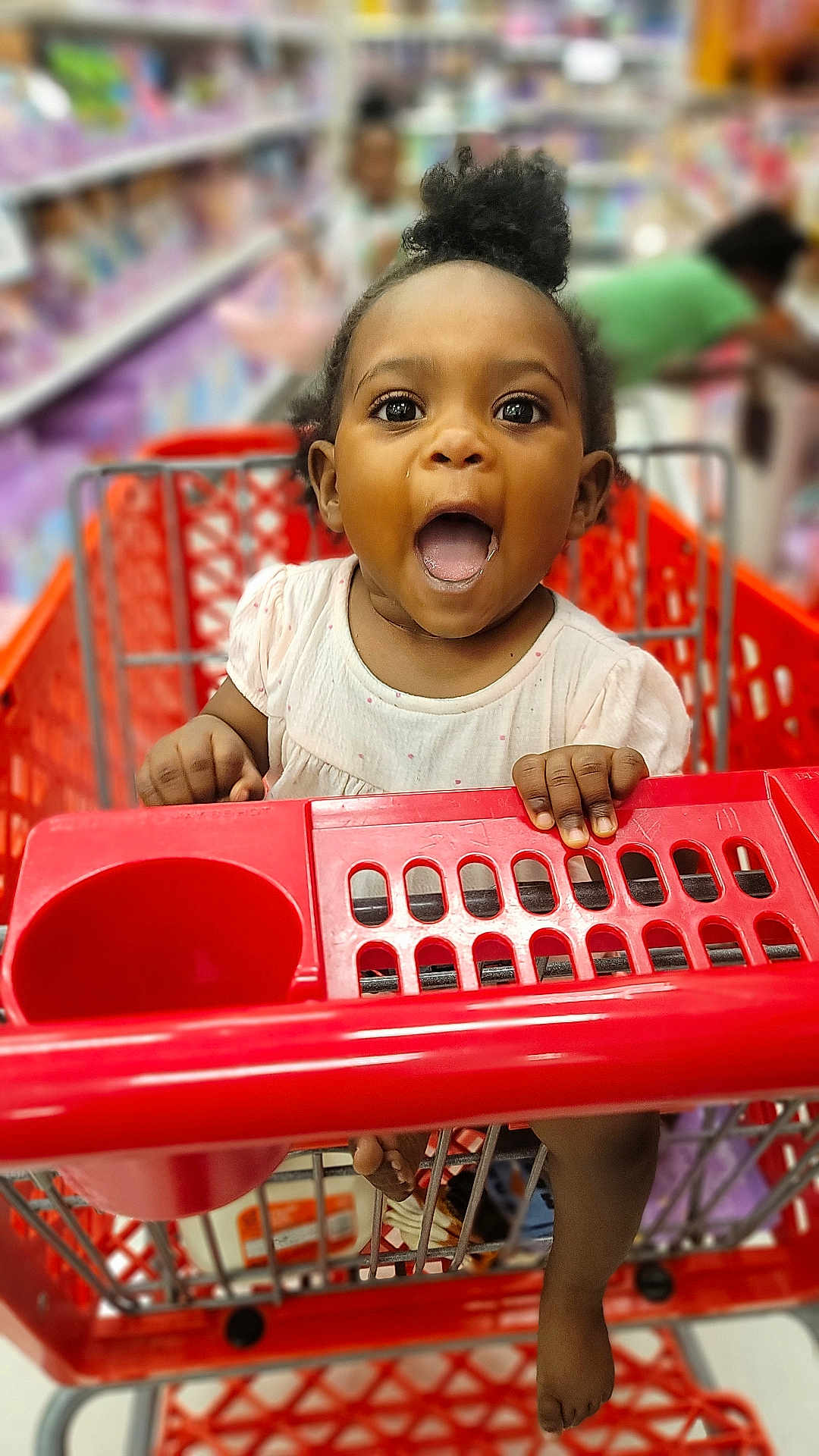 Braighlee joined the competition — help win amazing prizes! aisle, baby, child, clothing, cute, expression, face, foot, grocery, happy, holding, infant, person, retail, shopping, shopping_cart, store, supermarket, surprised, toddler