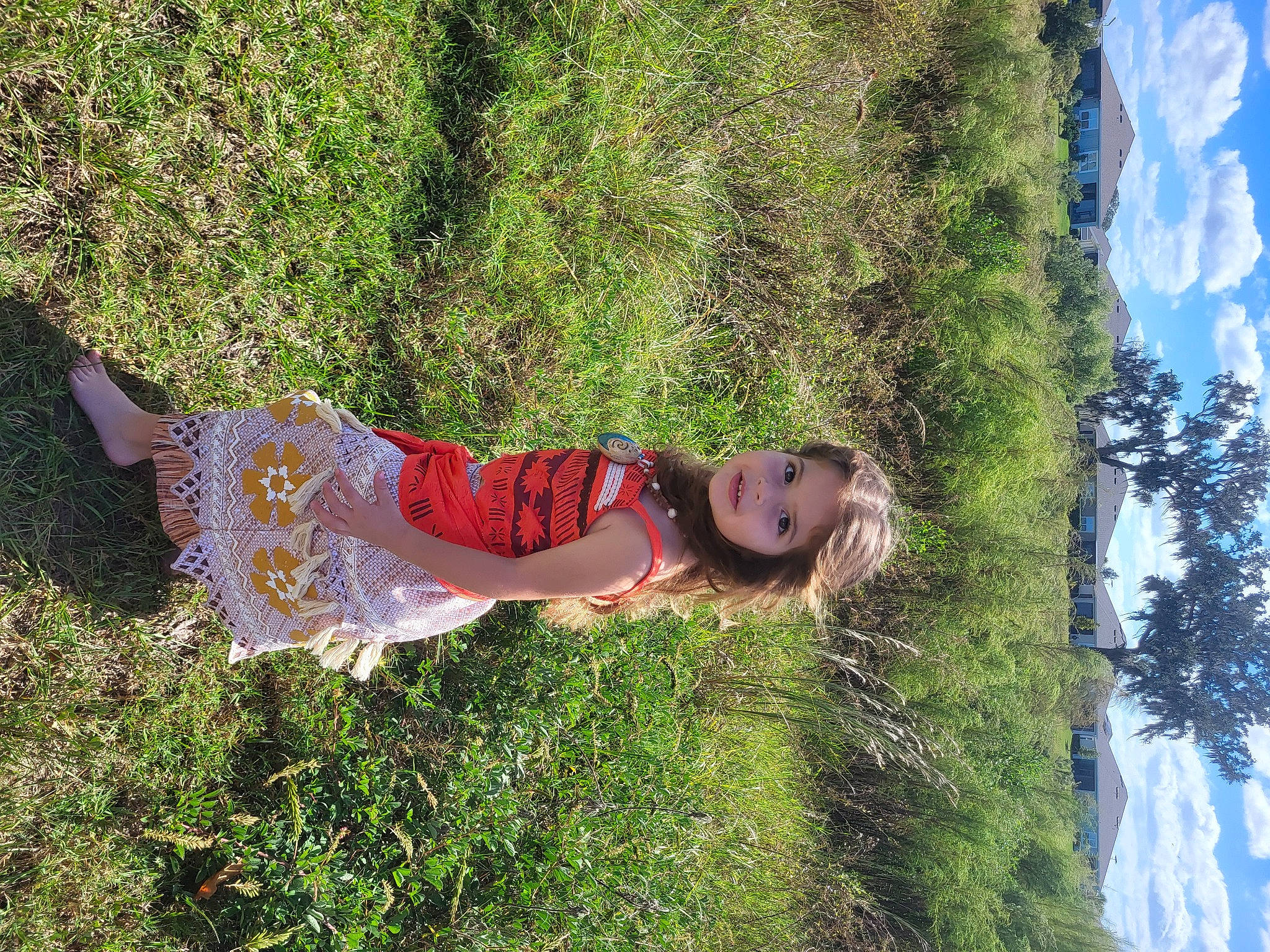 Raelynn is registered to the contest to win money with this photo: child, cloud, fun, garden, grass, happy, landscape, leisure, people_in_nature, person, plant, shrub, sky, summer, sunlight, toddler, tree, vacation, vegetation, water