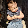 Paisley is registered to the contest to win money with this photo: baby, child, stroller, pigtails, striped_shirt, denim_pants, bottle, hands, cute, seated, indoor, clothing, infant, person, baby_bottle, casual_wear, young_child, portrait, happy, toddler