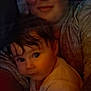 Paisley joined the competition — help win amazing prizes! baby, child, person, face, parent, portrait, indoors, closeup, expression, curly_hair, cuddling, warm_light, casual_clothing, skin, head, love, family, toddler, smile, intimate