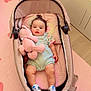 Layane a rejoint le concours — aidez-le/la à gagner de superbes lots ! baby, infant, stuffed_toy, pink, baby_carrier, carpet, heart_shape, floor, dresser, toy, child, clothing, shoes, indoor, cute, soft_toy, person, relaxing, comfort, home