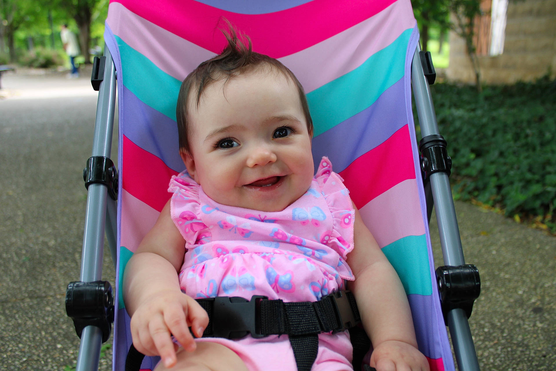 Prayla joined the competition — help win amazing prizes! baby, baby_carriage, baby_products, baby_toddler_clothing, facial_expression, fun, grass, happy, joy, leisure, magenta, person, photograph, pink, plant, product, recreation, skin, smile, snapshot