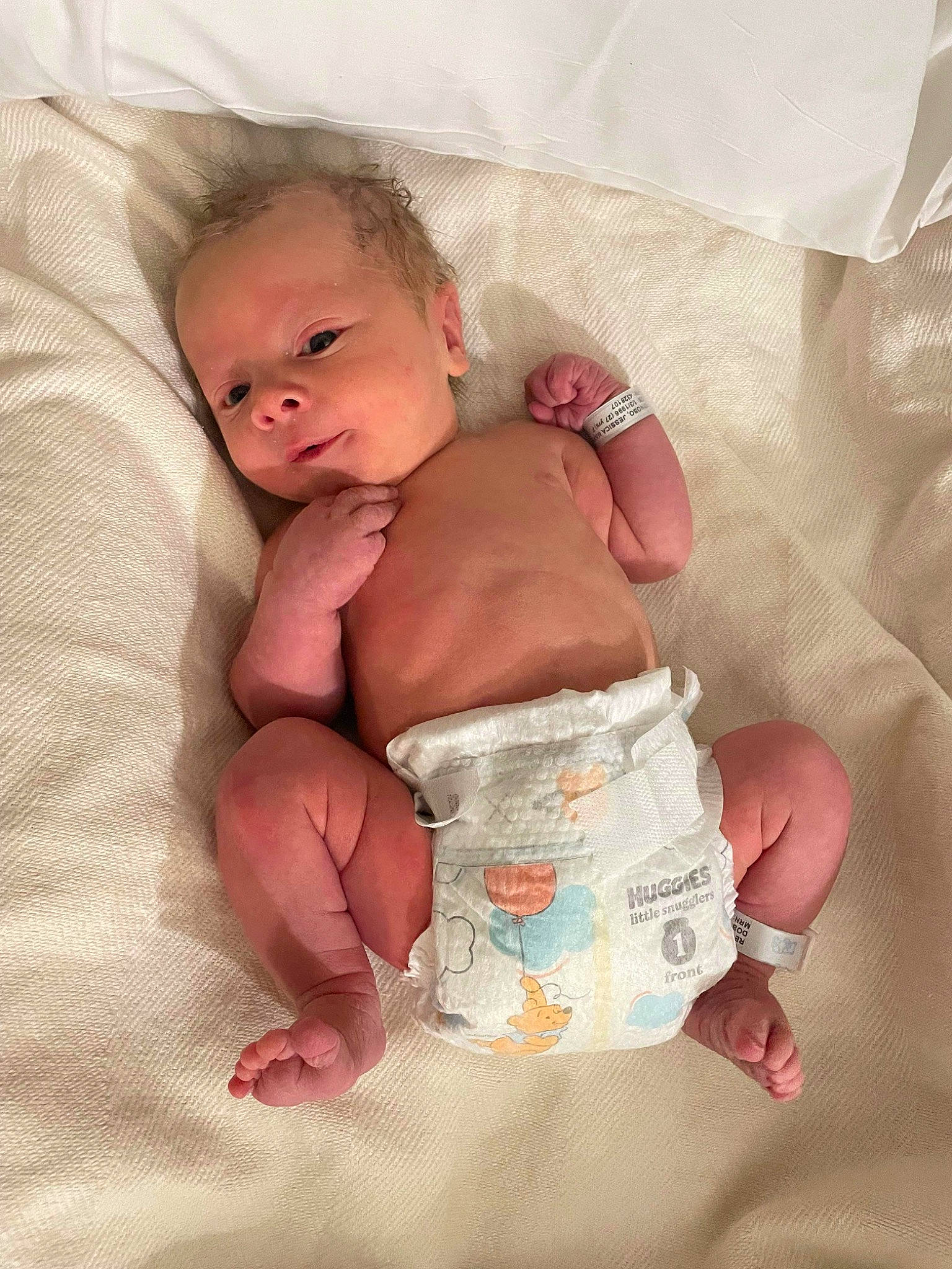 Arthur is registered to the contest to win money with this photo: abdomen, baby, baby_products, baby_sleeping, baby_toddler_clothing, bedding, cheek, chest, child, comfort, diaper, human_leg, linens, person, pink, room, skin, stomach, textile, toddler