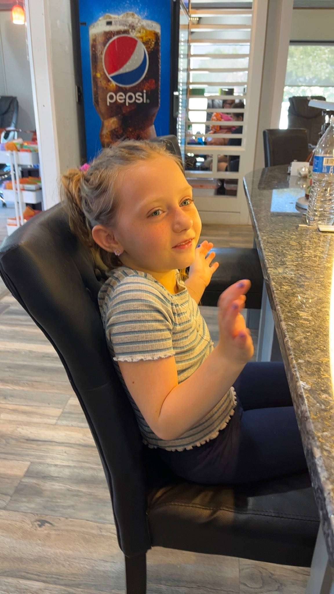 Pyper joined the competition — help win amazing prizes! baby, baby_toddler_clothing, bookcase, chair, child, desk, flooring, fun, human_leg, leisure, person, shelf, shelving, sitting, t_shirt, table, tableware, thigh, toddler, water_bottle