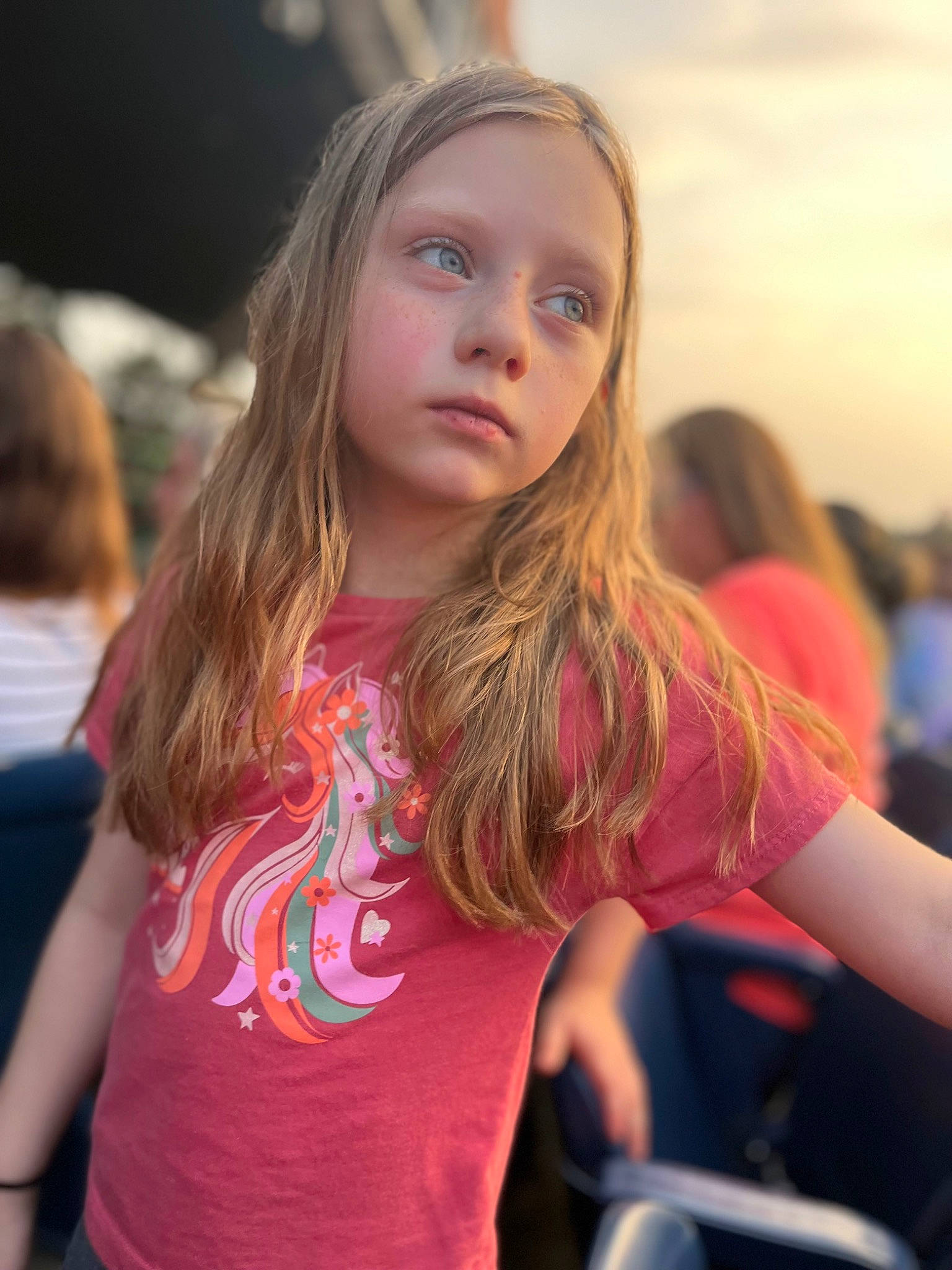 Pyper is registered to the contest to win money with this photo: blond, brown_hair, child, crowd, event, fun, hair, happy, leisure, long_hair, magenta, party, person, portrait_photography, recreation, room, shoulder, sitting, t_shirt, toddler