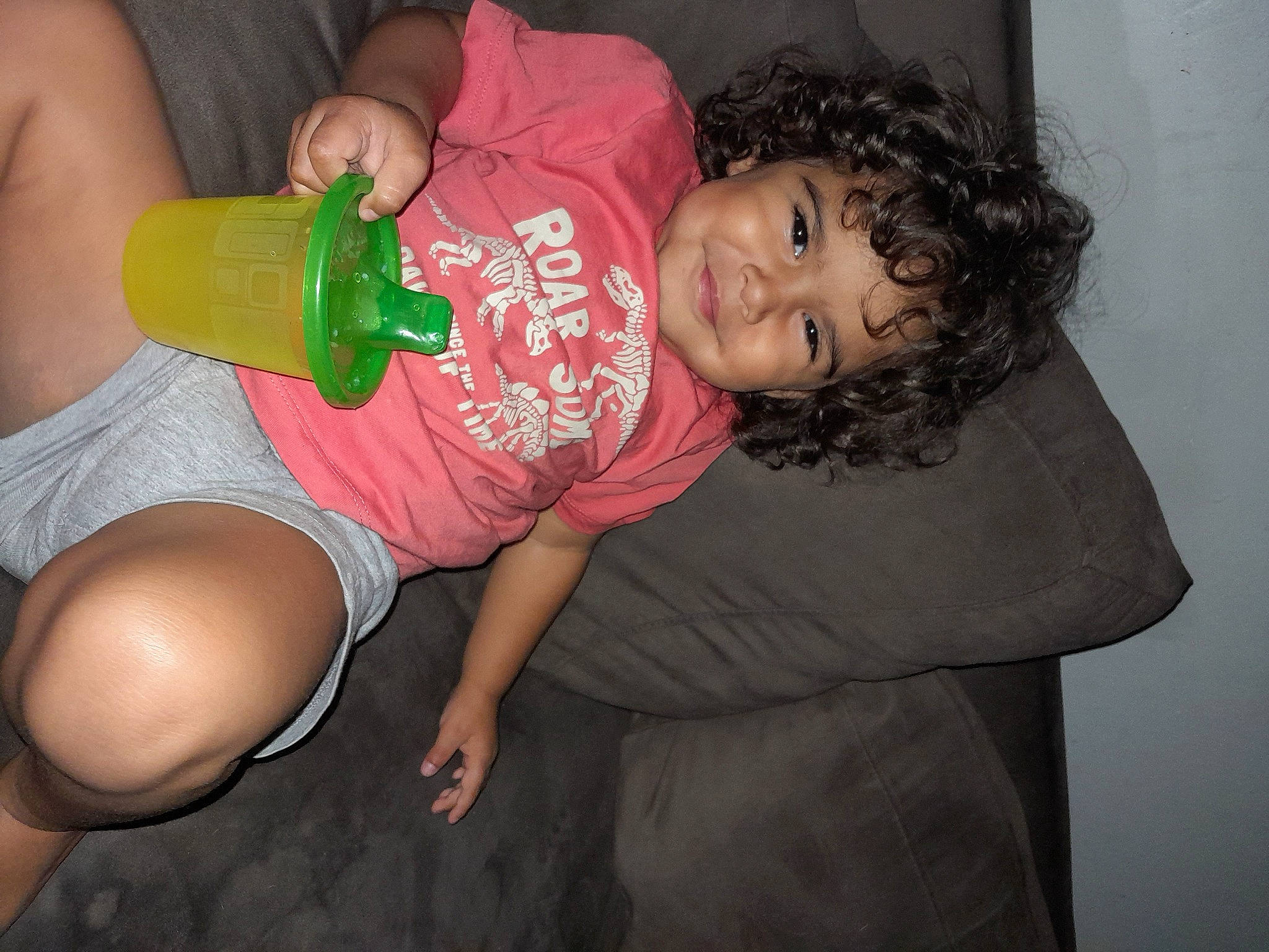 Atticus is registered to the contest to win money with this photo: baby, baby_bottle, baby_toddler_clothing, balloon, bottle, child, drinkware, flash_photography, foot, fun, happy, head, human_leg, joy, nail, person, plastic_bottle, sitting, skin, t_shirt