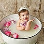 Félicia a rejoint le concours — aidez-le/la à gagner de superbes lots ! baby, bathtub, bubbles, child, cute, flower, flower_crown, hands, happy, infant, milk_bath, pink, portrait, purple, roses, skin, smiling, water, white, wooden_floor