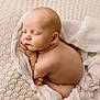 Brody is registered to the contest to win money with this photo: baby, newborn, sleeping, infant, blanket, soft_texture, wrapped, nude, peaceful, cute, skin, hand, foot, closeup, portrait, resting, cozy, warm, indoors, tender