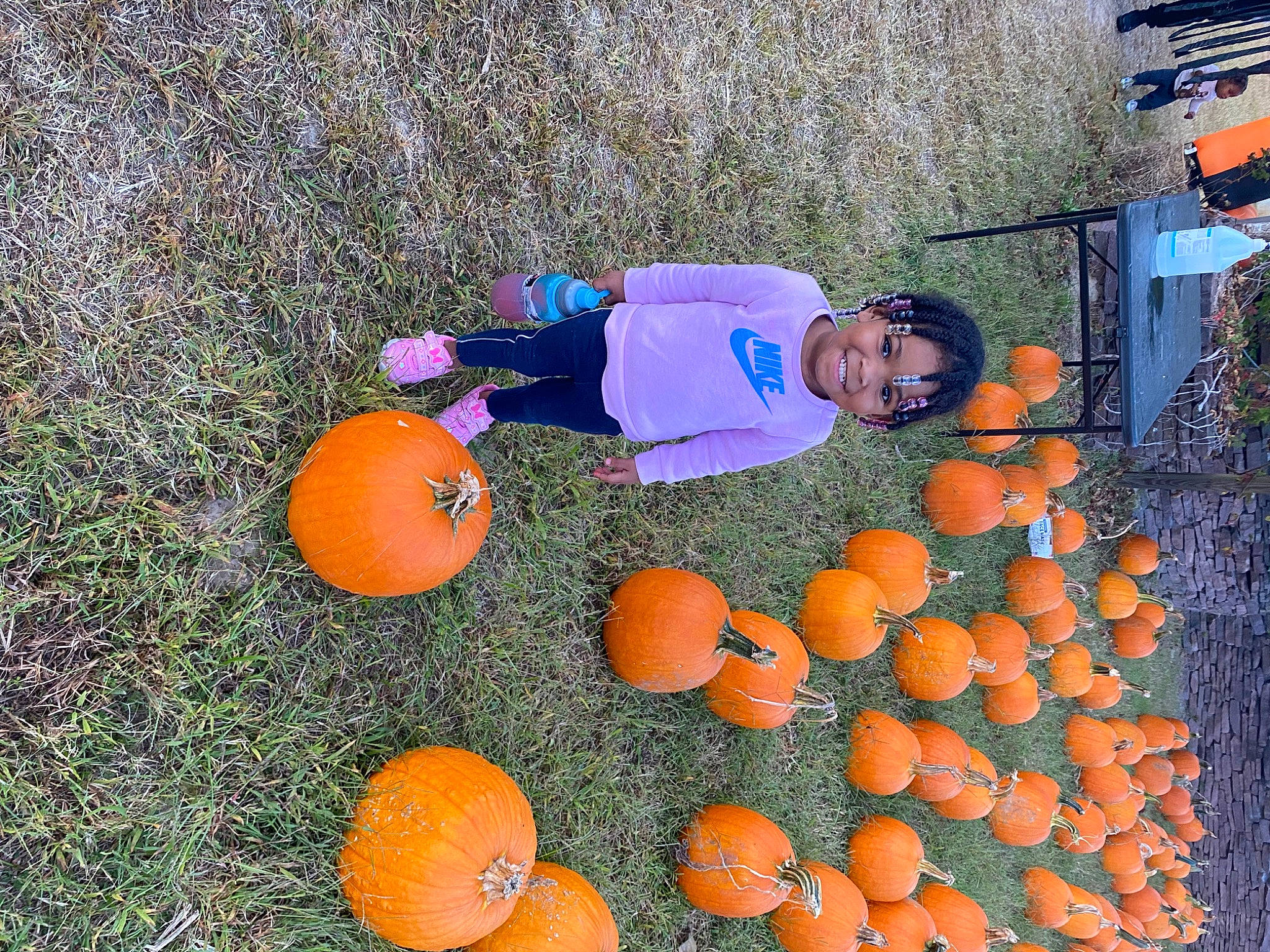 Azuri joined the competition — help win amazing prizes! calabaza, cucurbita, fruit, fun, gourd, hat, joy, leisure, local_food, natural_foods, orange, people_in_nature, person, plant, produce, pumpkin, smile, squash, tire, vegetable