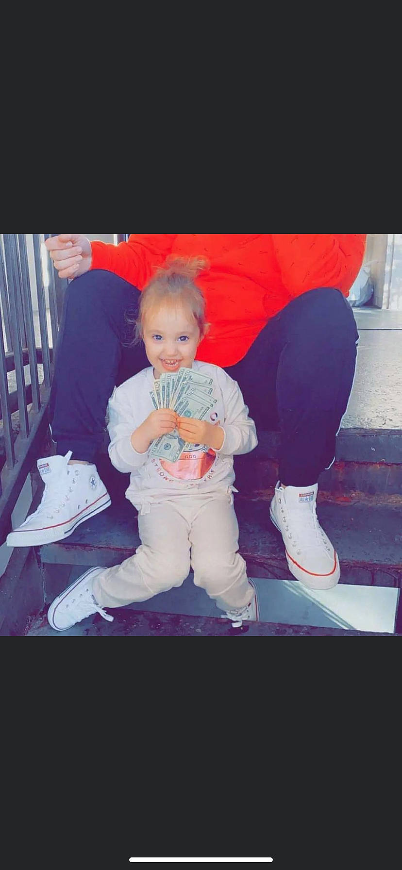 Zaleigh Monroe is registered to the contest to win money with this photo: baby, baby_toddler_clothing, carmine, child, comfort, cool, flooring, fun, gesture, happy, joy, lap, magenta, person, photo_caption, pink, sitting, sleeve, smile, sportswear