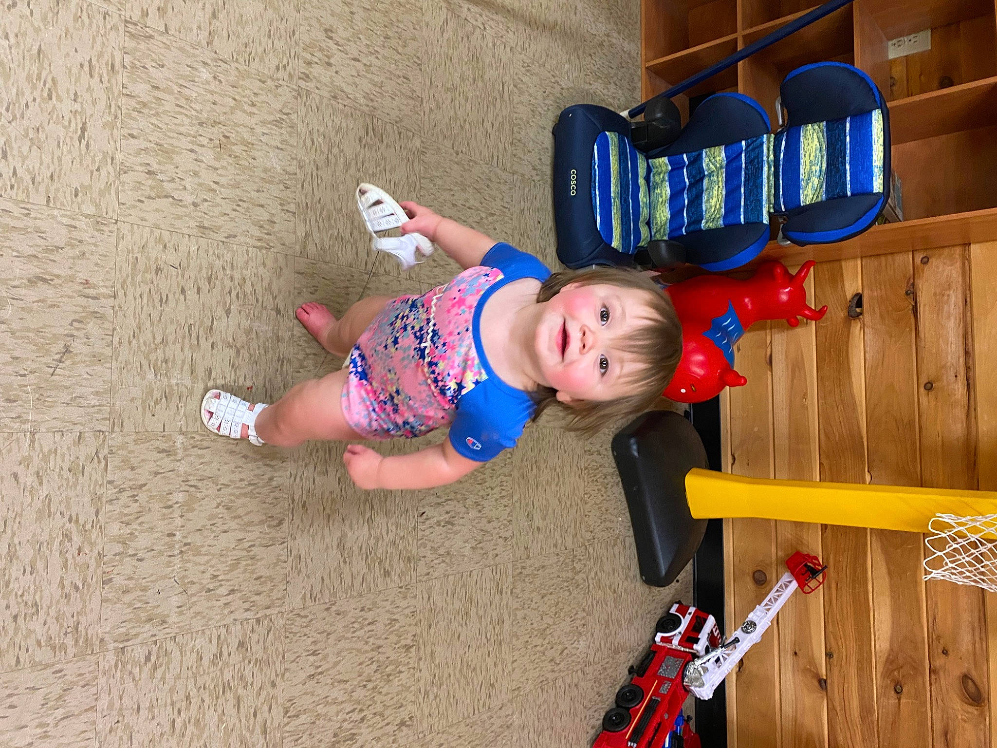 Journey Grace joined the competition — help win amazing prizes! baby, baby_toddler_clothing, child, electric_blue, flooring, fun, hardwood, human_leg, leisure, logo, person, play, room, smile, t_shirt, toddler, toy, vacation, varnish, wood