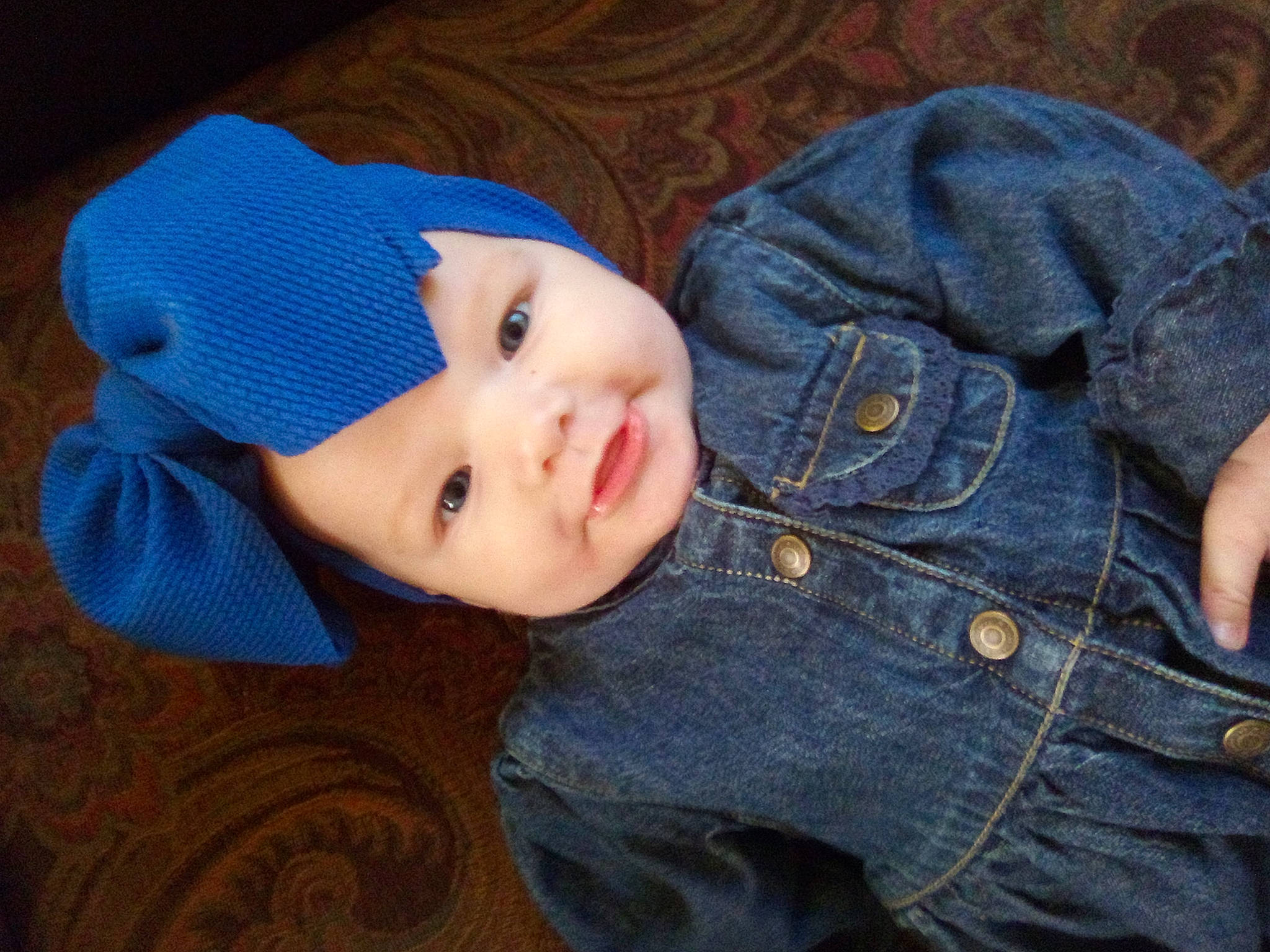 Olivia joined the competition — help win amazing prizes! baby, baby_toddler_clothing, cap, cheek, child, cool, electric_blue, flash_photography, hat, headwear, lip, mouth, nose, outerwear, pattern, person, skin, sleeve, smile, textile