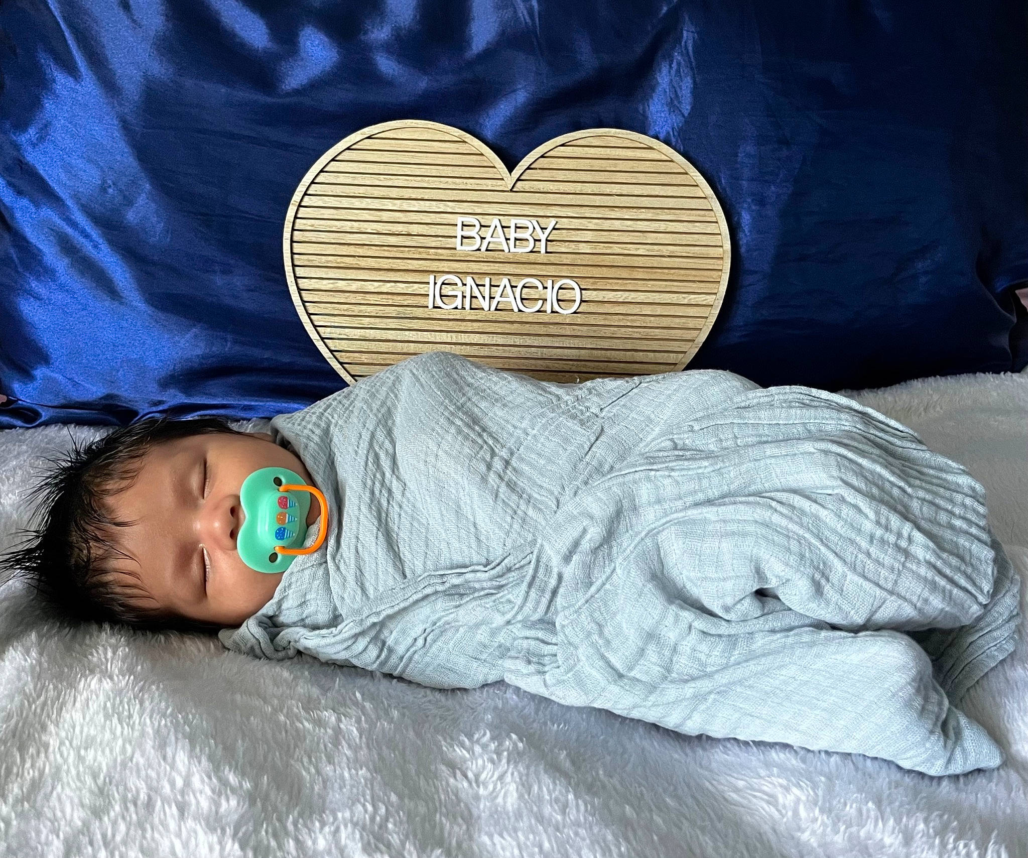 Ignacio joined the competition — help win amazing prizes! baby, child, comfort, denim, electric_blue, facial_expression, flooring, font, grey, hand, happy, linens, nap, pattern, person, sitting, t_shirt, tints_and_shades, toddler, tree