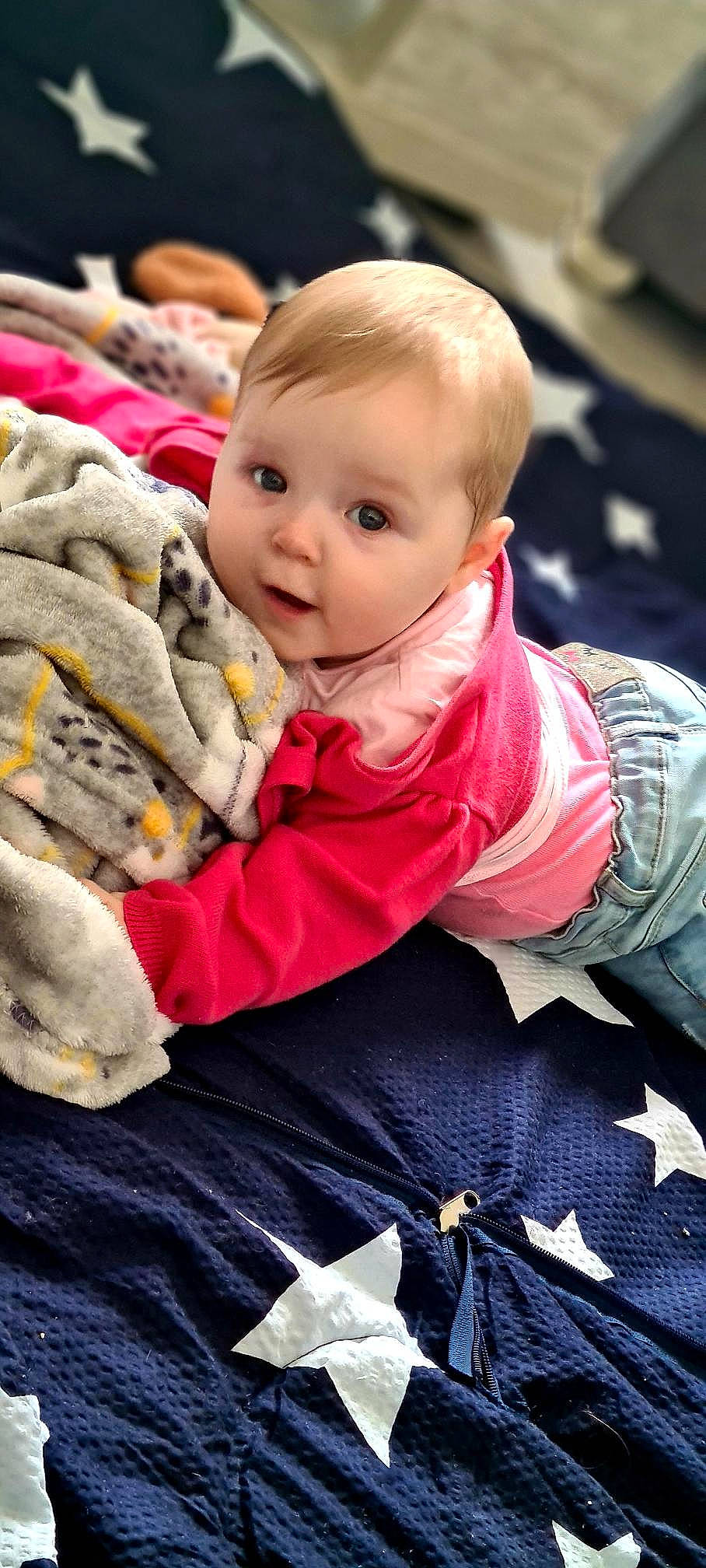 Athenays a rejoint le concours — aidez-le/la à gagner de superbes lots ! baby, baby_products, baby_toddler_clothing, child, comfort, fur, grass, happy, jacket, linens, person, portrait_photography, sitting, toddler, tradition, winter, wool