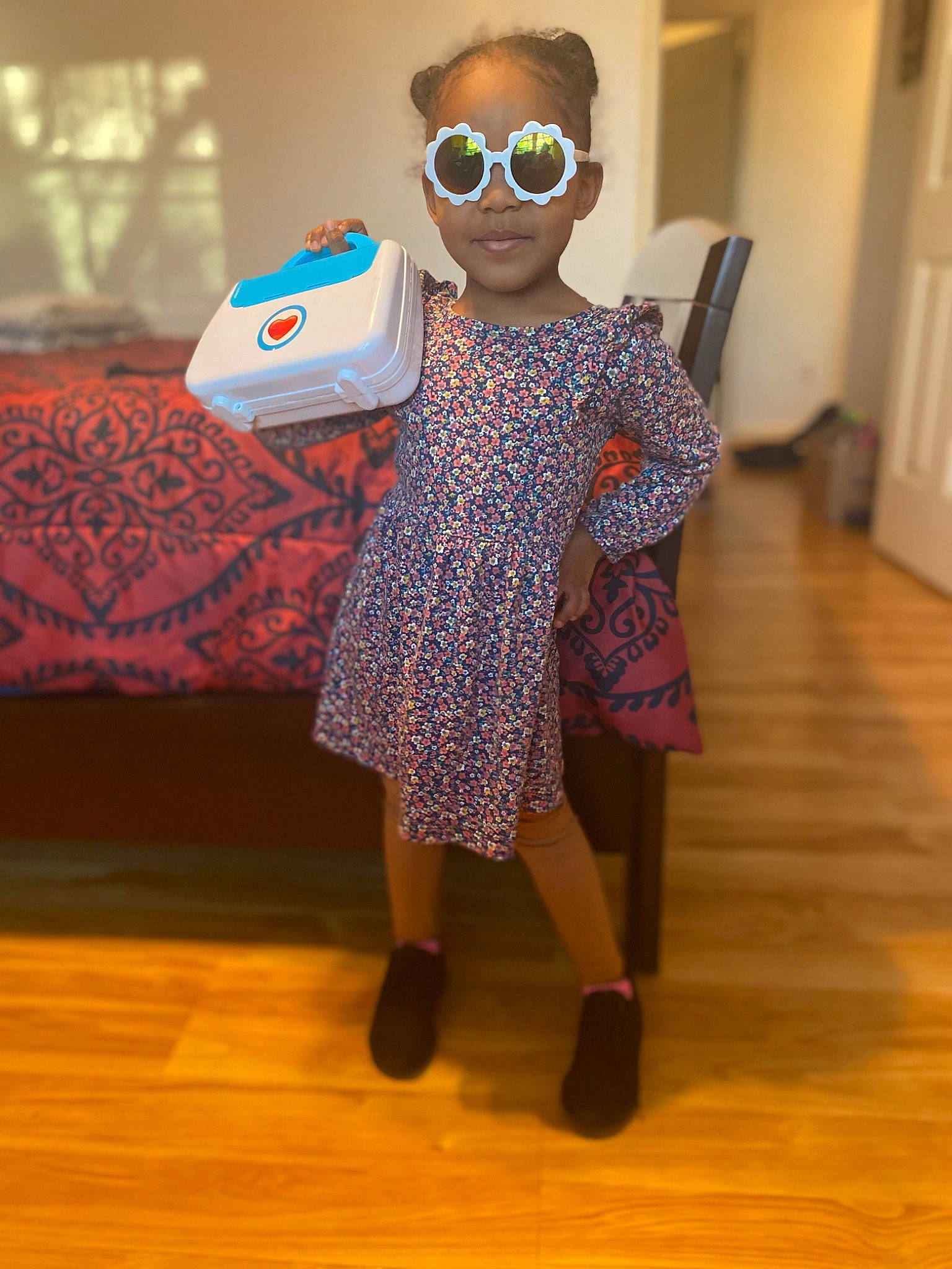 Joleigh is registered to the contest to win money with this photo: electric_blue, eyewear, fashion_design, flooring, fun, glasses, goggles, hardwood, knee, orange, pattern, person, personal_protective_equipment, sleeve, sportswear, sunglasses, t_shirt, vision_care, visual_arts, waist