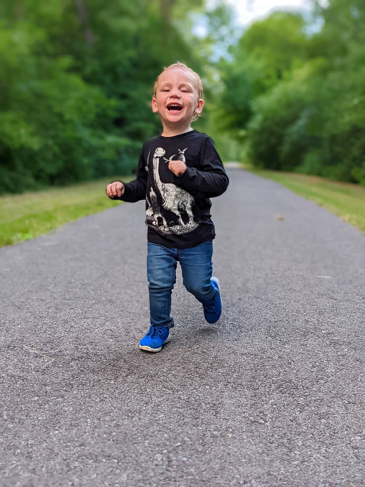 Sebastian joined the competition — help win amazing prizes! asphalt, child, denim, electric_blue, fun, gesture, grass, grassland, happy, landscape, leisure, people_in_nature, person, plant, recreation, road, road_surface, soil, toddler, tree