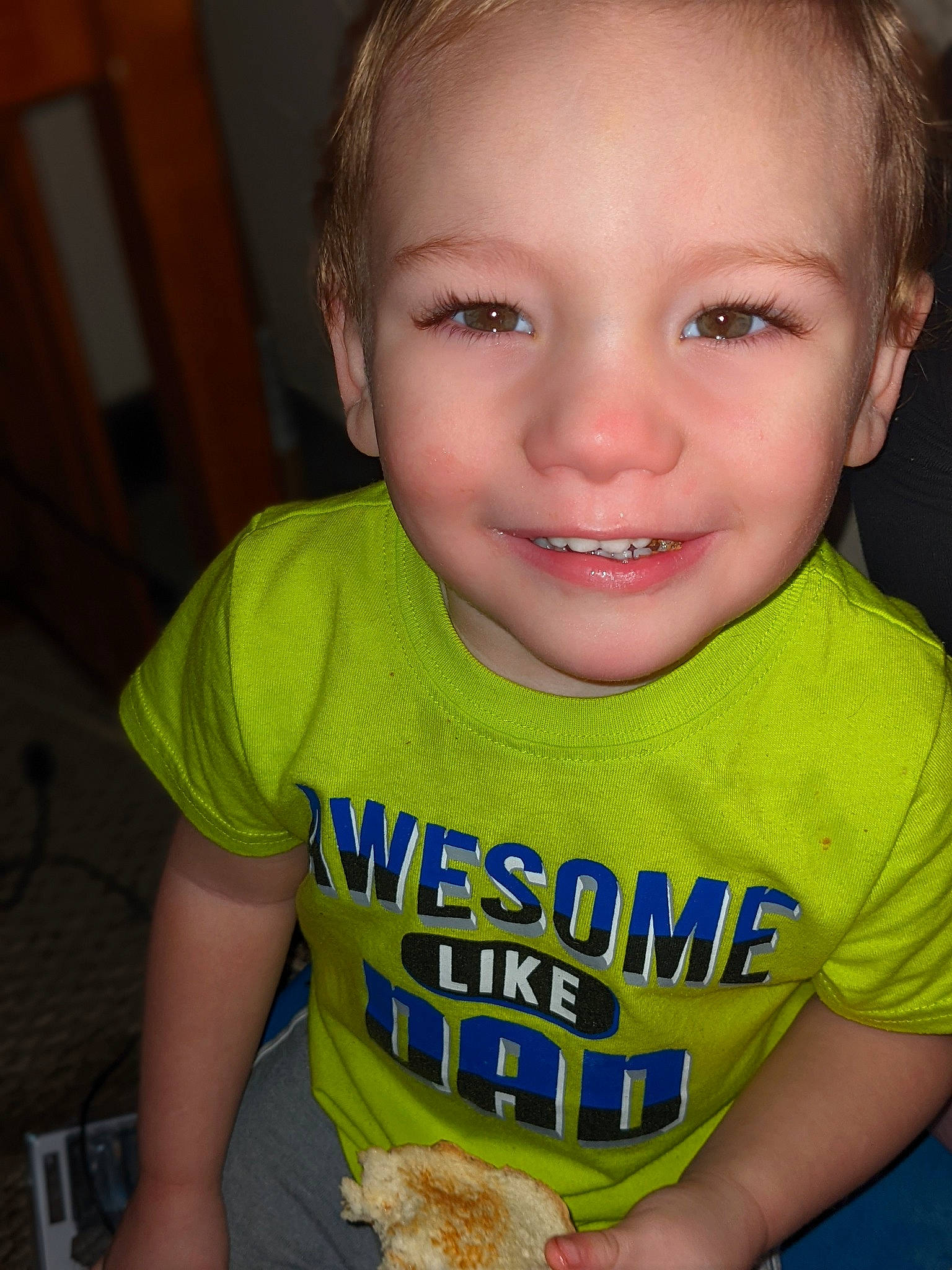 Sebastian is registered to the contest to win money with this photo: baby_toddler_clothing, cheek, eyebrow, eyelash, finger, forehead, fun, hand, happy, iris, joy, mammal, mouth, neck, nose, organ, person, skin, sleeve, smile