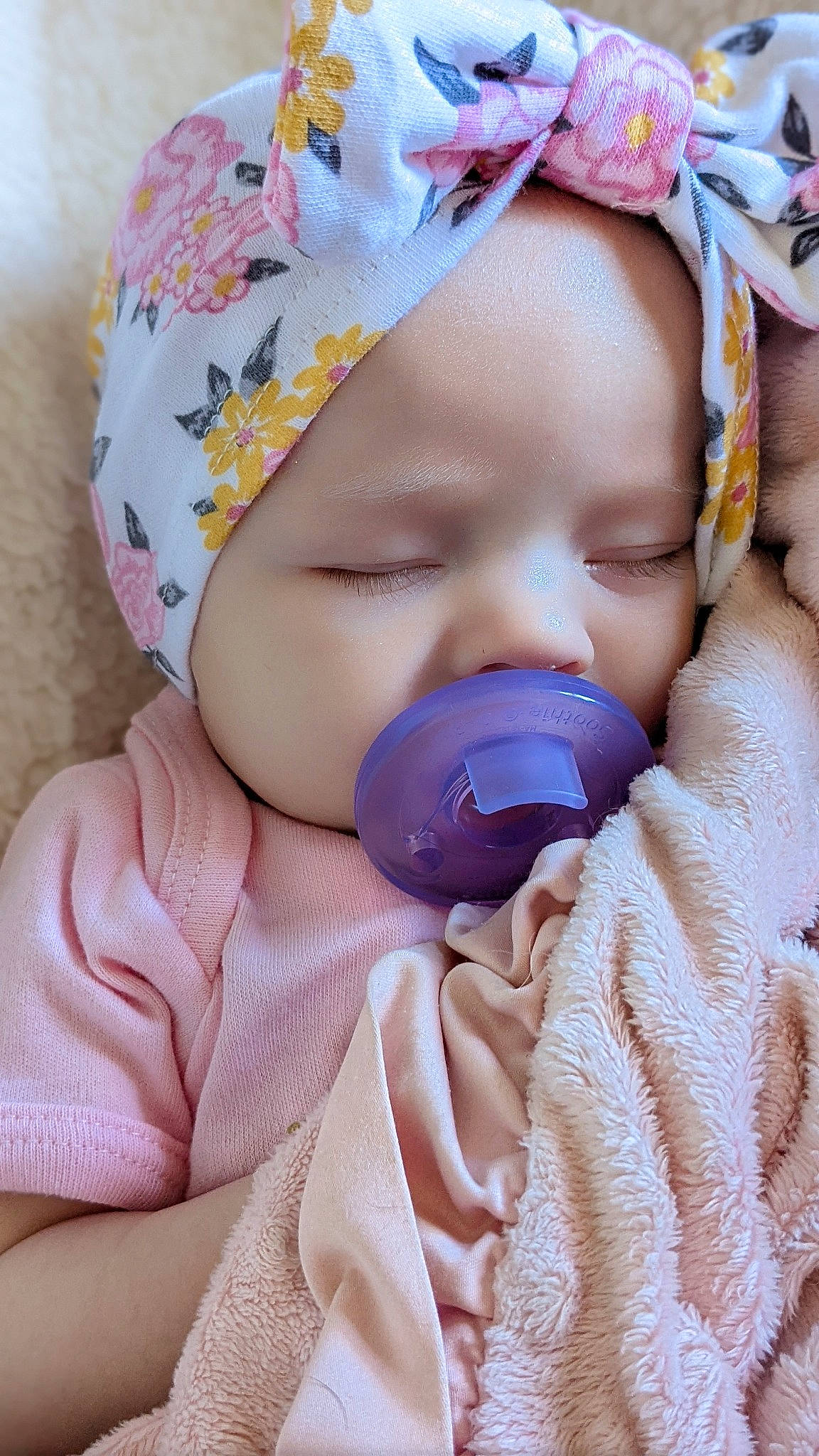 Paislynn is registered to the contest to win money with this photo: baby, baby_products, baby_safety, baby_sleeping, baby_toddler_clothing, cheek, child, close_up, comfort, eyelash, headwear, linens, lip, mouth, nose, person, pink, product, skin, textile