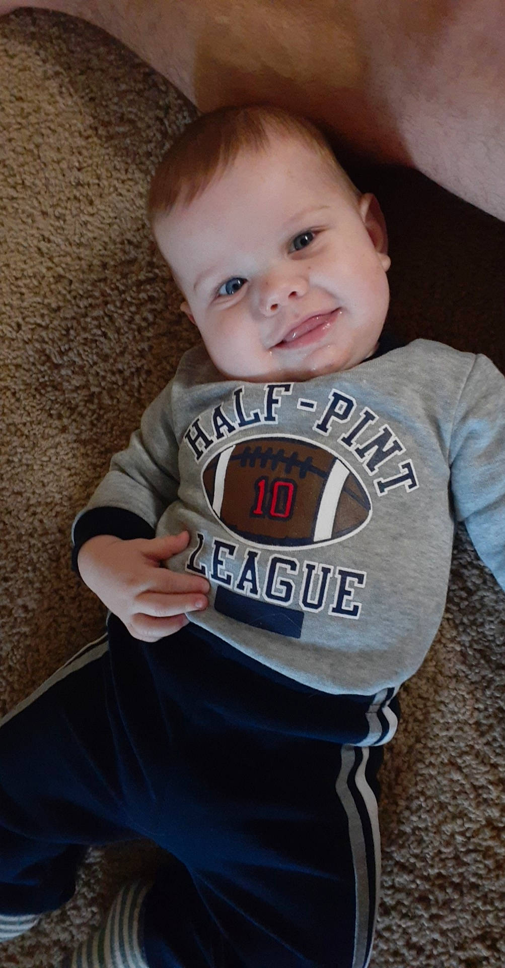 Gage is registered to the contest to win money with this photo: baby, baby_products, baby_toddler_clothing, cheek, child, cool, joy, person, product, sleeve, smile, t_shirt, toddler