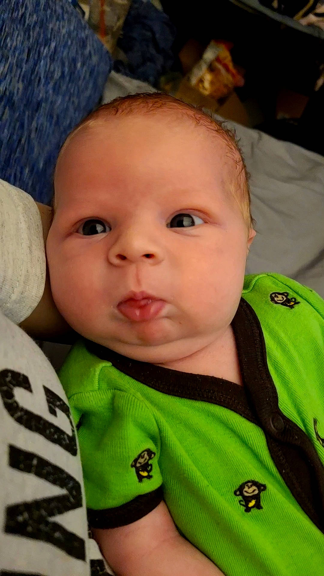 Brylon is registered to the contest to win money with this photo: baby, baby_toddler_clothing, cheek, chin, ear, eyebrow, eyelash, facial_expression, finger, forehead, iris, lip, mouth, nose, organ, outerwear, person, skin, sleeve, textile