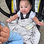 Elwood Liam Brown joined the competition — help win amazing prizes! baby, blanket, car_seat, bottle, child, infant, outdoor, person, seatbelt, toddler, clothing, curious, cute, face, hand, ground, sitting, smiling, young_child, wearing