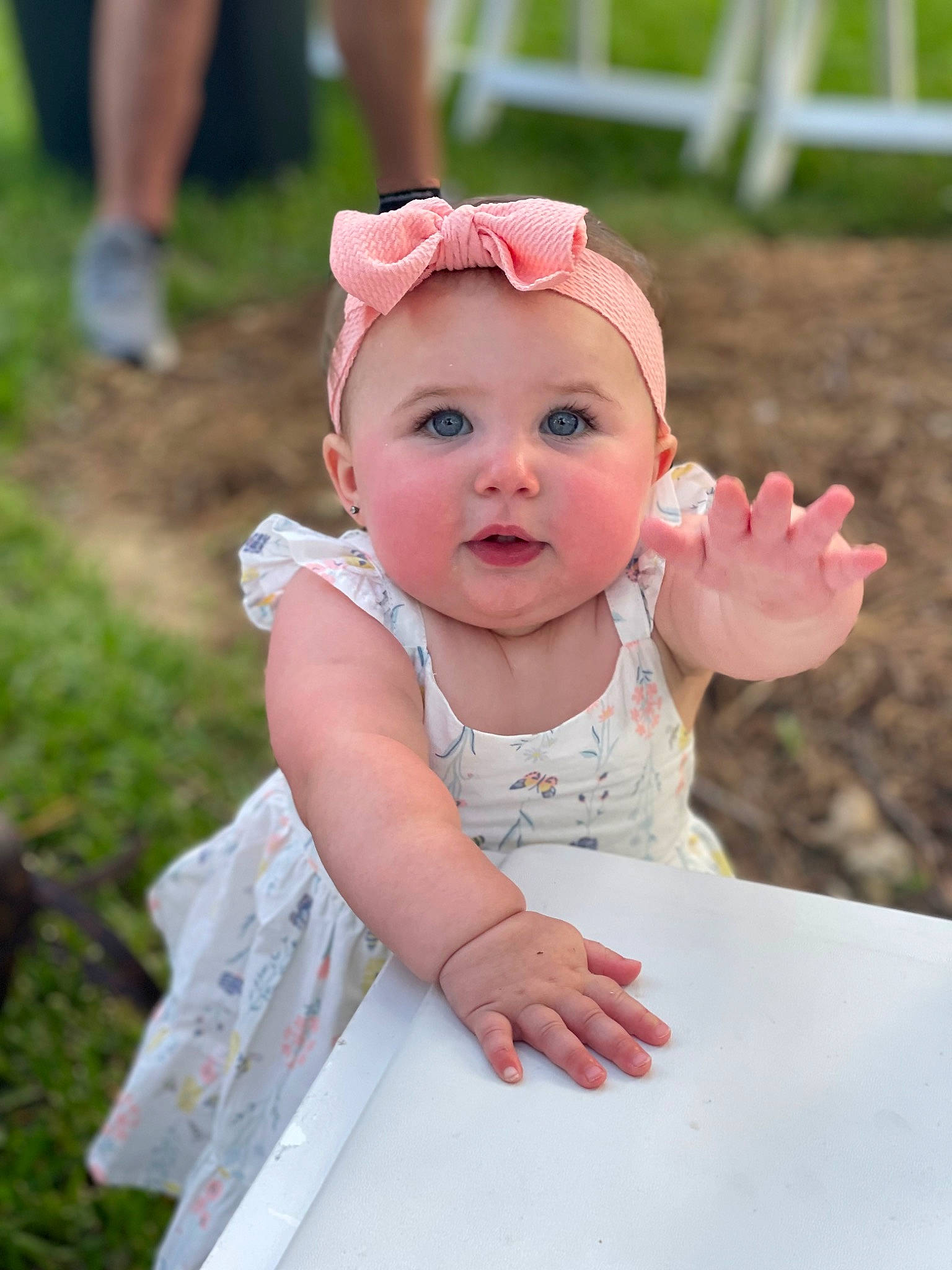 Kenna joined the competition — help win amazing prizes! baby, baby_toddler_clothing, cap, child, face, fun, gesture, grass, happy, headband, headpiece, headwear, jewellery, lip, people, people_in_nature, person, pink, skin, sleeve