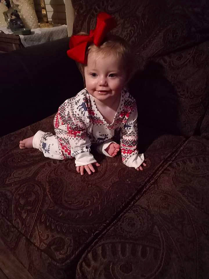 Haisley is registered to the contest to win money with this photo: baby, baby_toddler_clothing, carpet, child, eye, face, flash_photography, floor, flooring, happy, head, joy, magenta, person, sitting, skin, sleeve, smile, t_shirt, textile