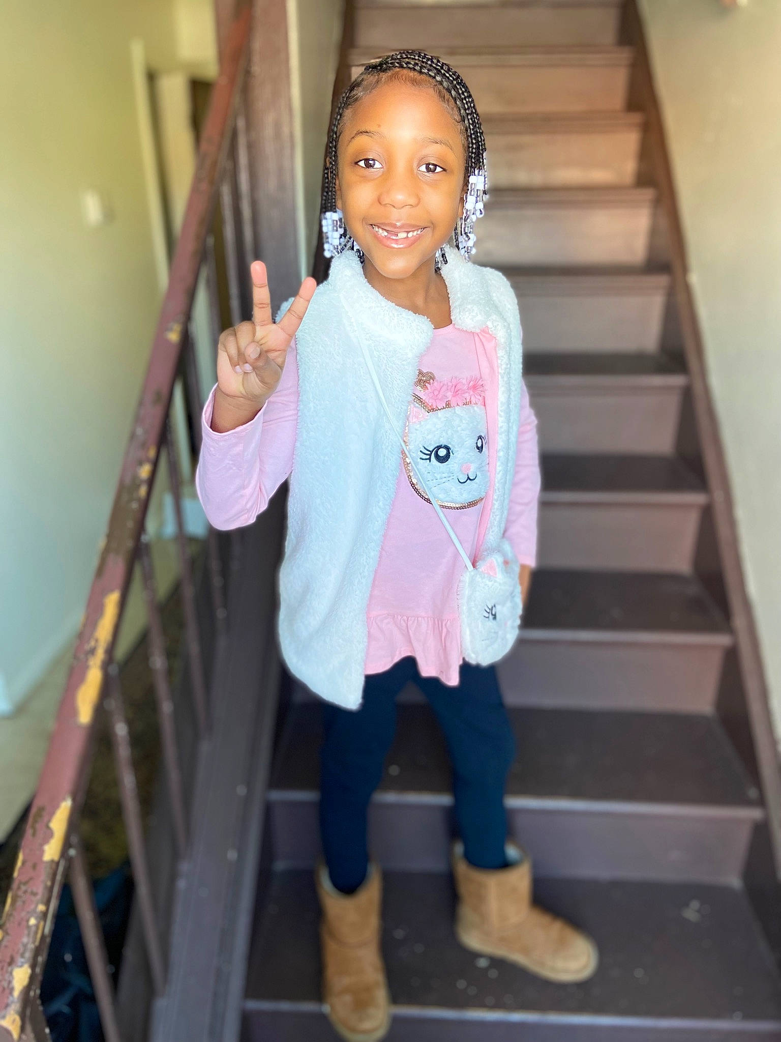 Amara joined the competition — help win amazing prizes! baby, baby_toddler_clothing, child, child_model, denim, fashion_accessory, fun, handrail, happy, joy, leisure, magenta, person, portrait_photography, room, sitting, sleeve, smile, stairs, standing