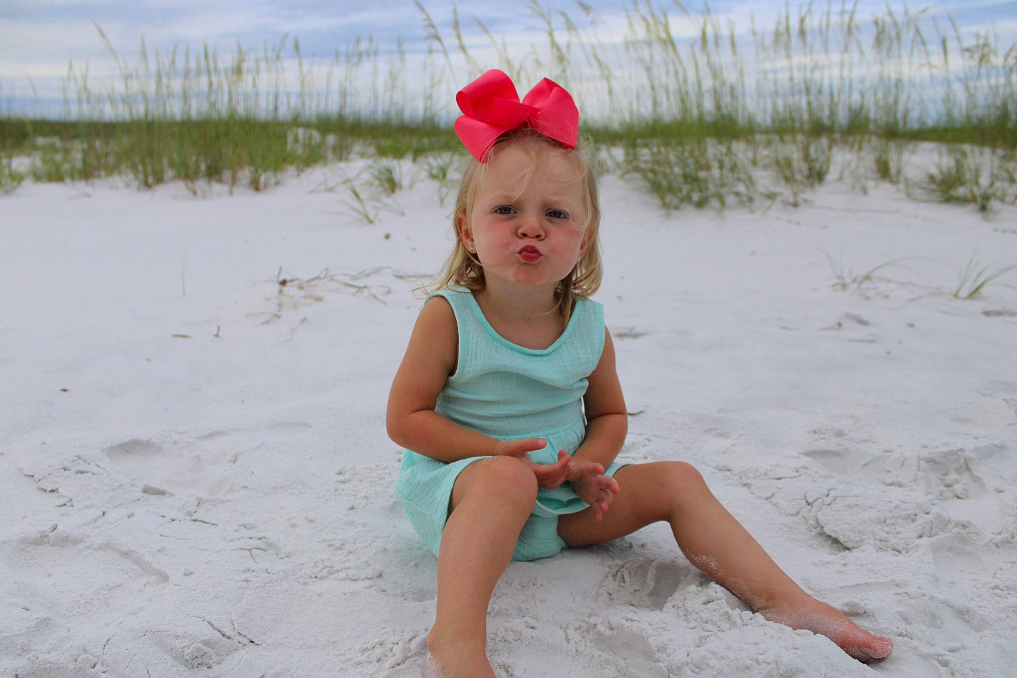 Charleigh joined the competition — help win amazing prizes! baby_toddler_clothing, beach, body_of_water, eye, face, fun, grass, happy, hat, head, human_body, landscape, natural_environment, people_in_nature, person, plant, shorts, sky, t_shirt, thigh