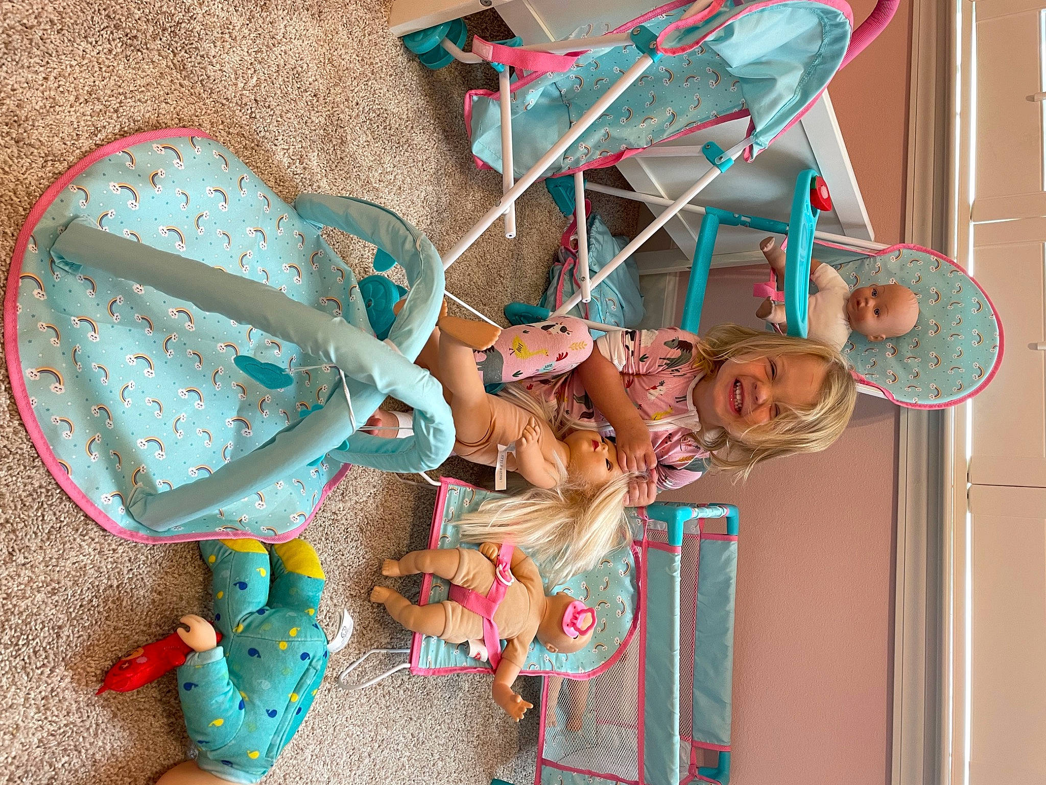 Charleigh is registered to the contest to win money with this photo: art, automotive_wheel_system, baby_products, baby_toys, child, fashion_accessory, fun, green, joy, magenta, musical_instrument, party_supply, pattern, person, pink, plastic, room, stuffed_toy, tire, toy
